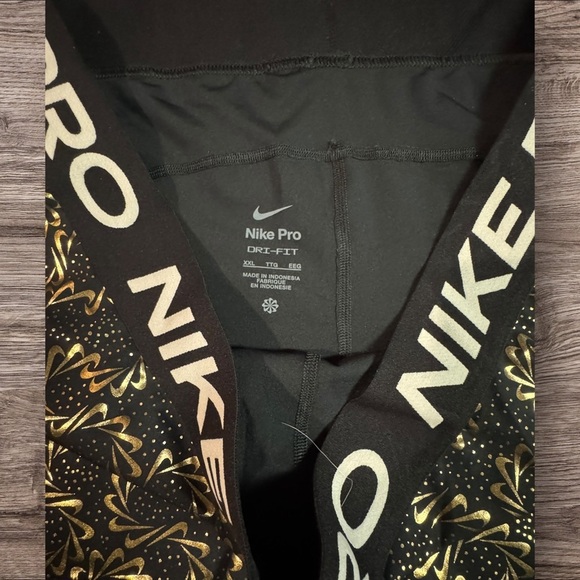 NWOT - Nike Women's Athletic Shorts in Black and Gold - Picture 4 of 5
